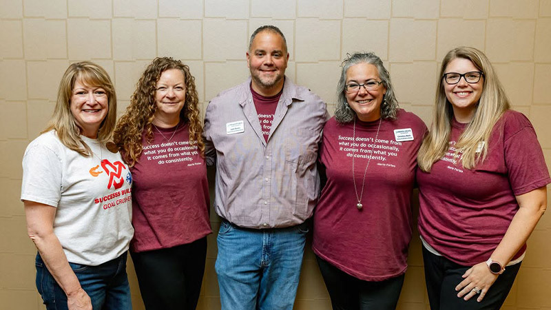 Group of Traditions employees during the annual company meeting
